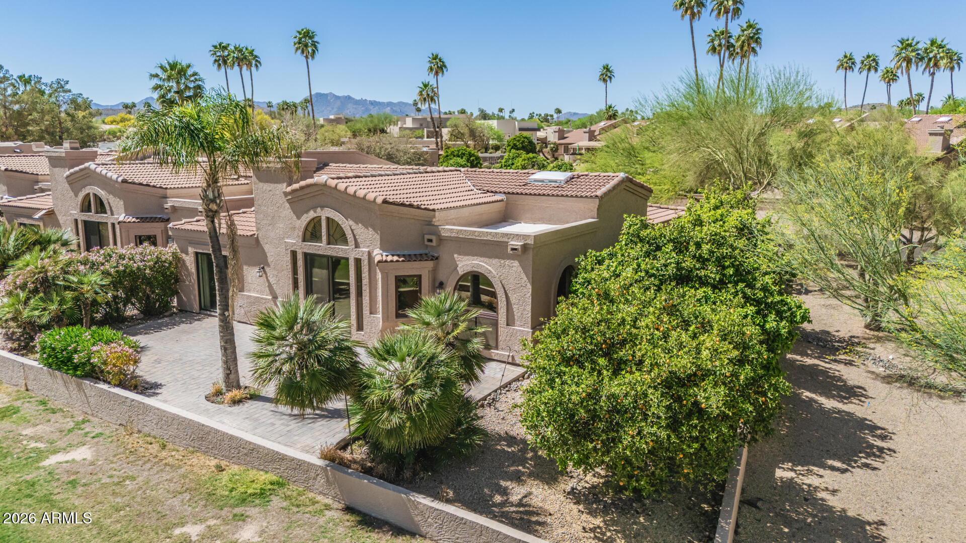 25615 North Bolero Bend, Unit 5 Rio Verde, AZ 85263 - Photo 44 of 57 a front view of a house with garden