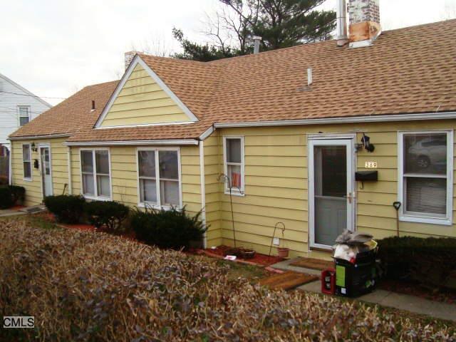 383 High Ridge Drive Bridgeport, CT 06606 - Photo 1 of 1 a front view of a house with garden