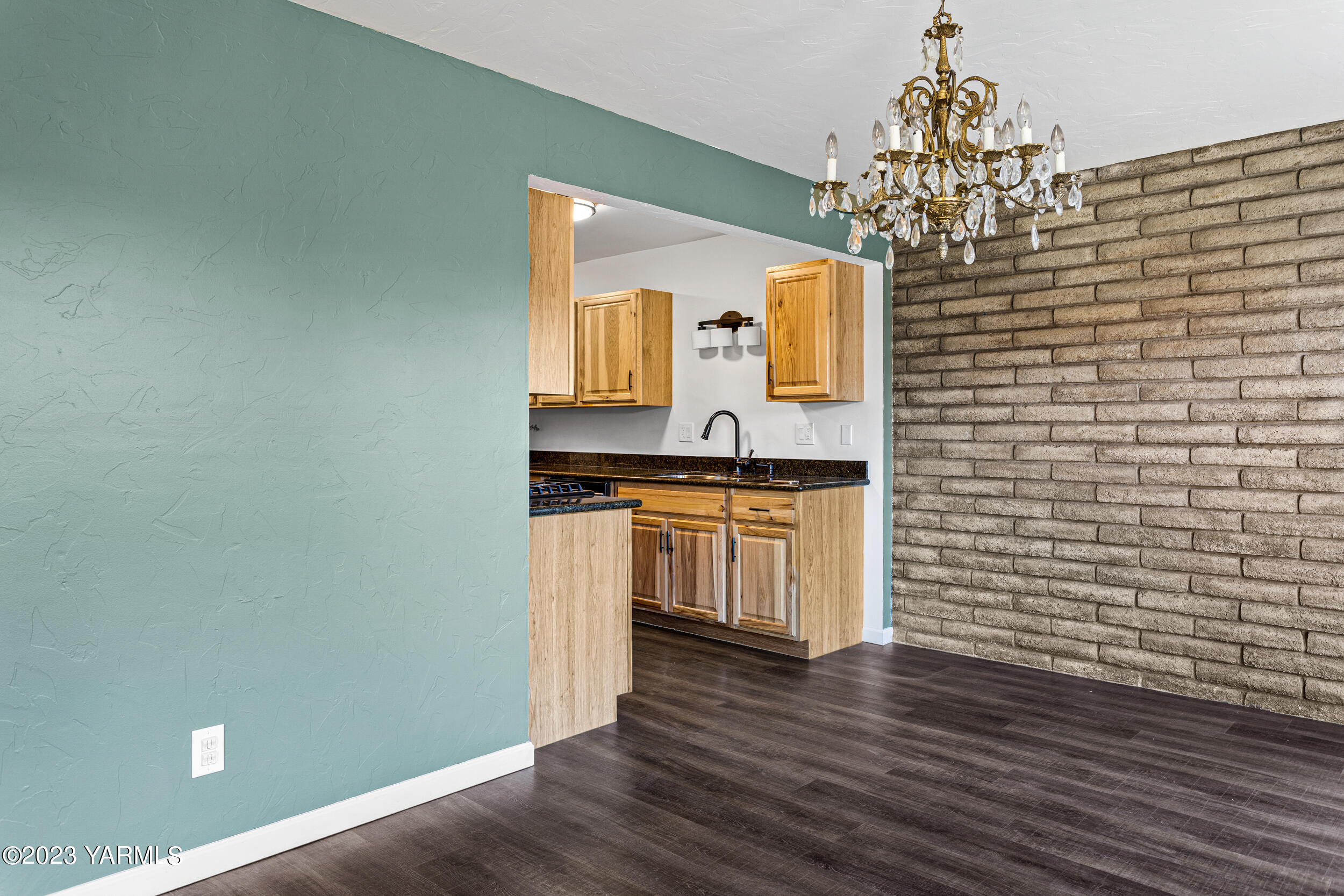 1 Crest Circle Yakima, WA 98908 - Photo 12 of 30 a view of kitchen with granite countertop cabinets a sink and a counter top space