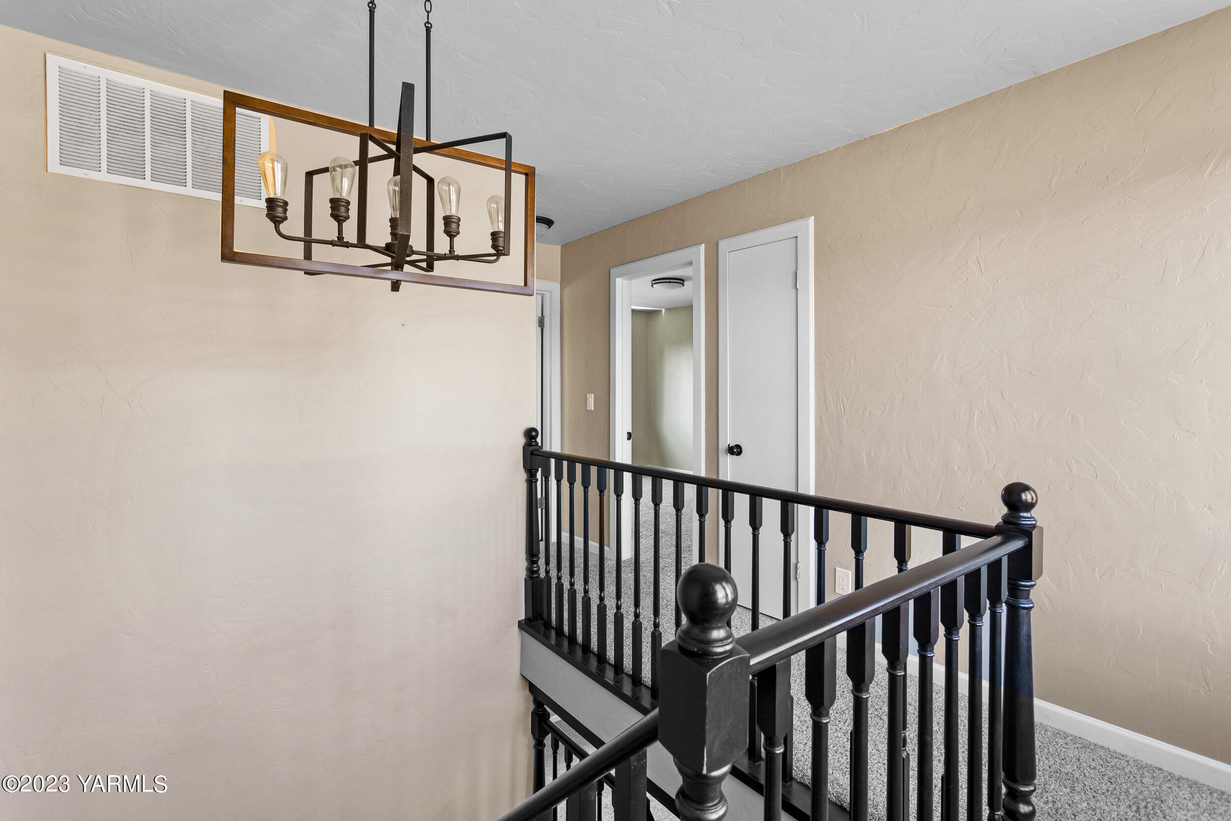 1 Crest Circle Yakima, WA 98908 - Photo 18 of 30 a view of a hallway with a door