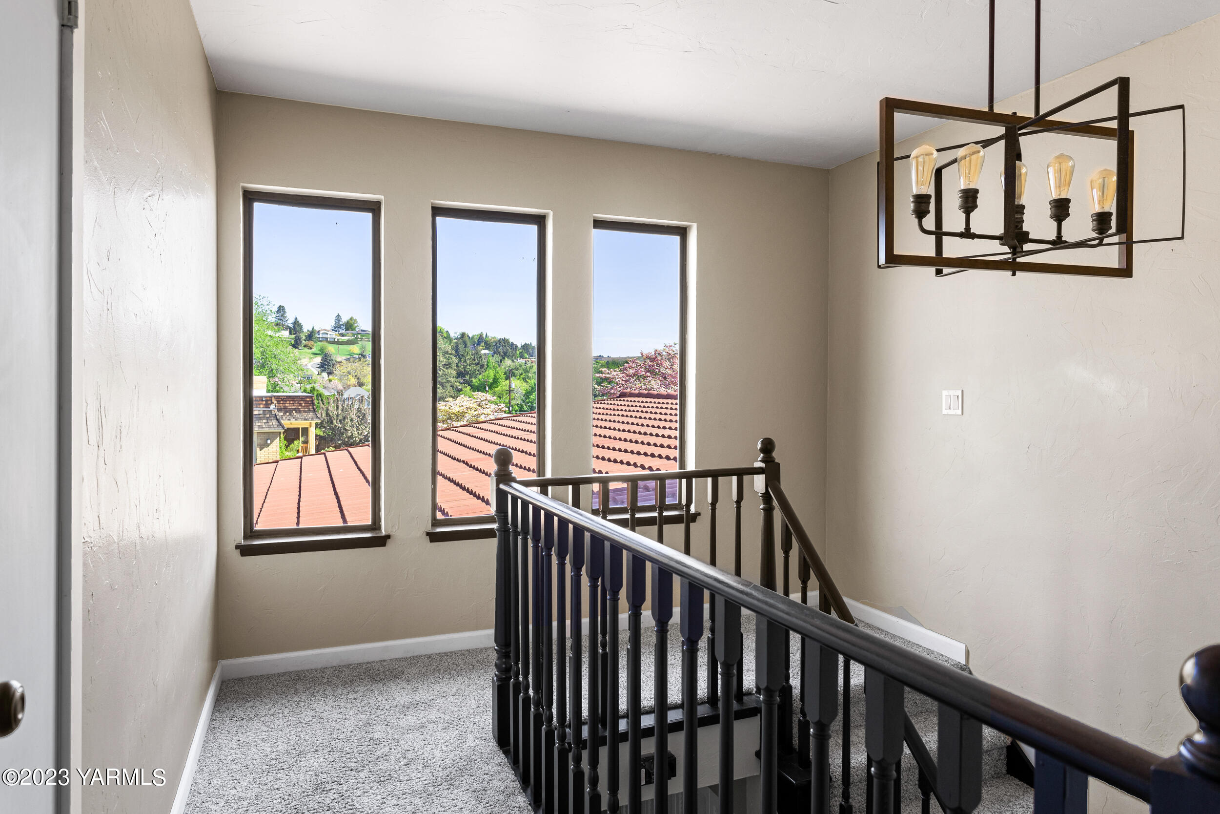 1 Crest Circle Yakima, WA 98908 - Photo 25 of 30 a view of staircase with furniture and windows