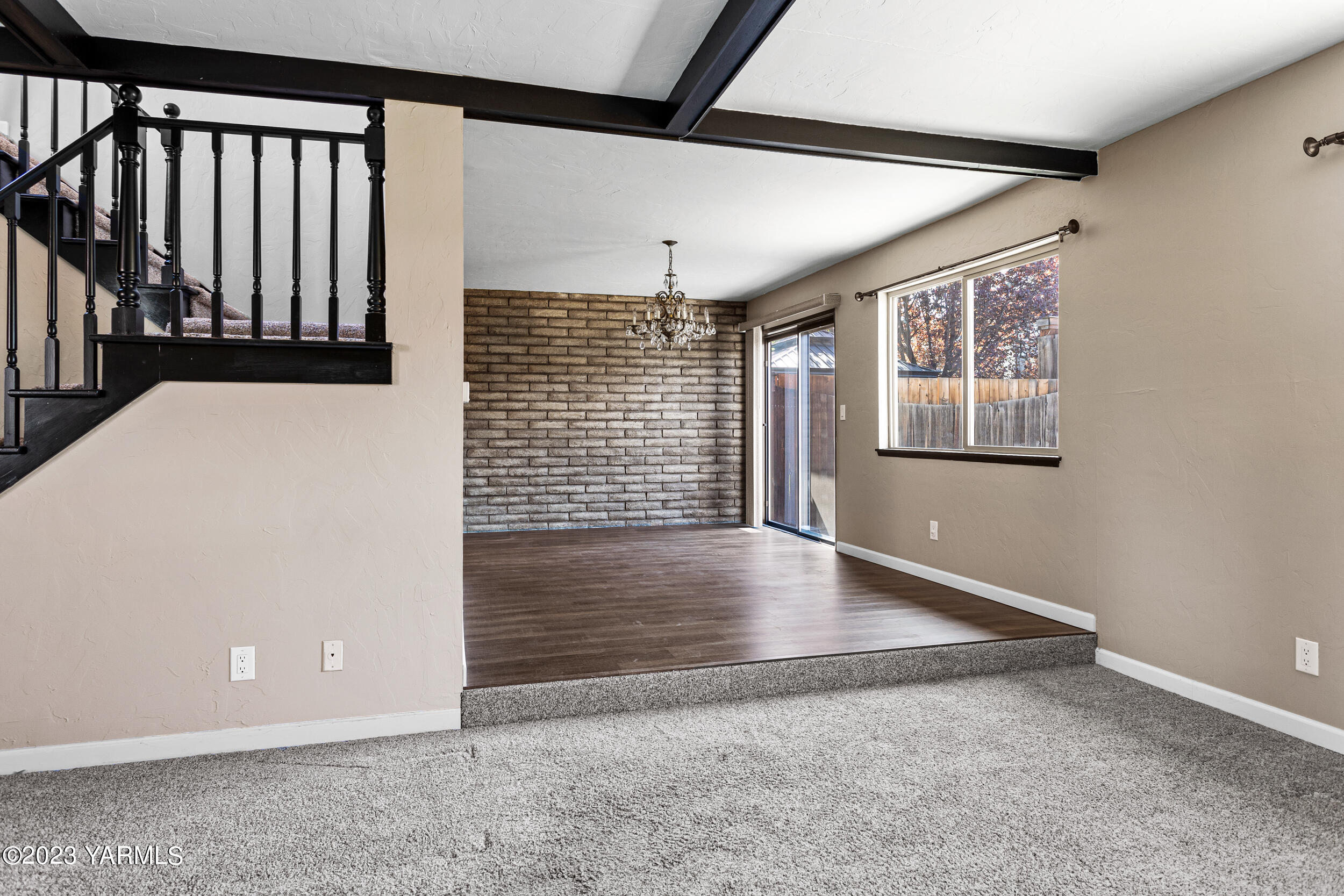 1 Crest Circle Yakima, WA 98908 - Photo 10 of 30 an empty room with wooden floor and windows