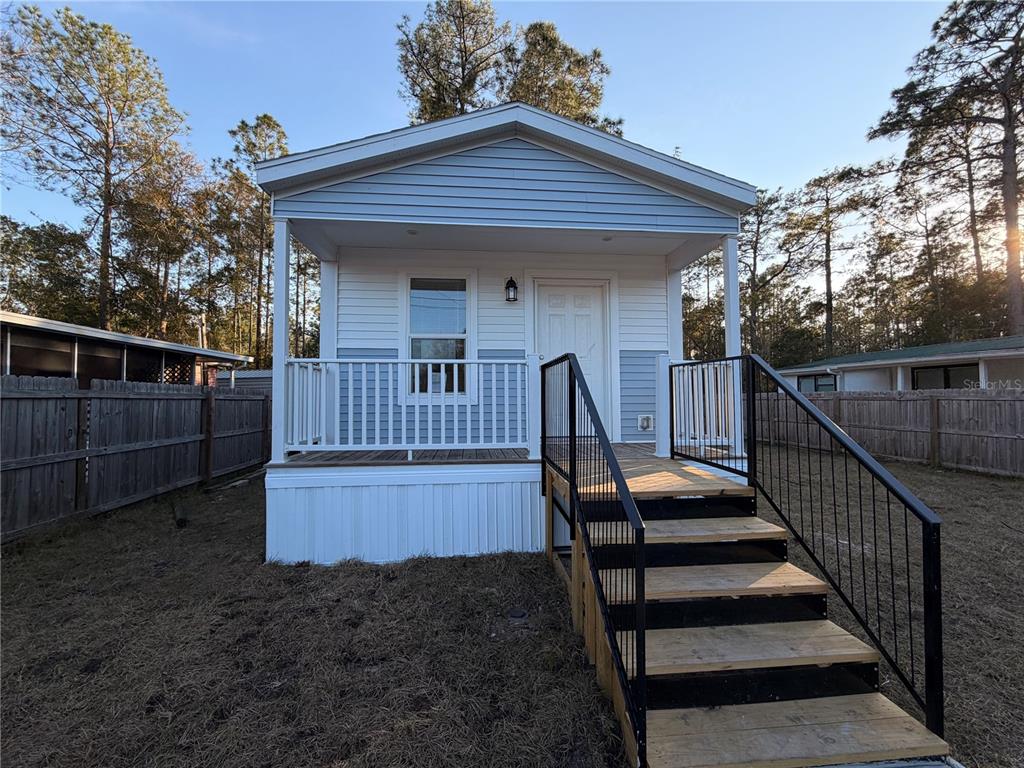 a view of outdoor space and deck