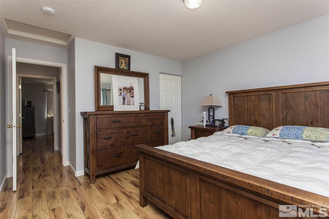 840 Roberts Street Reno, NV 89502 - Photo 15 of 25 a room with a bed and a dresser