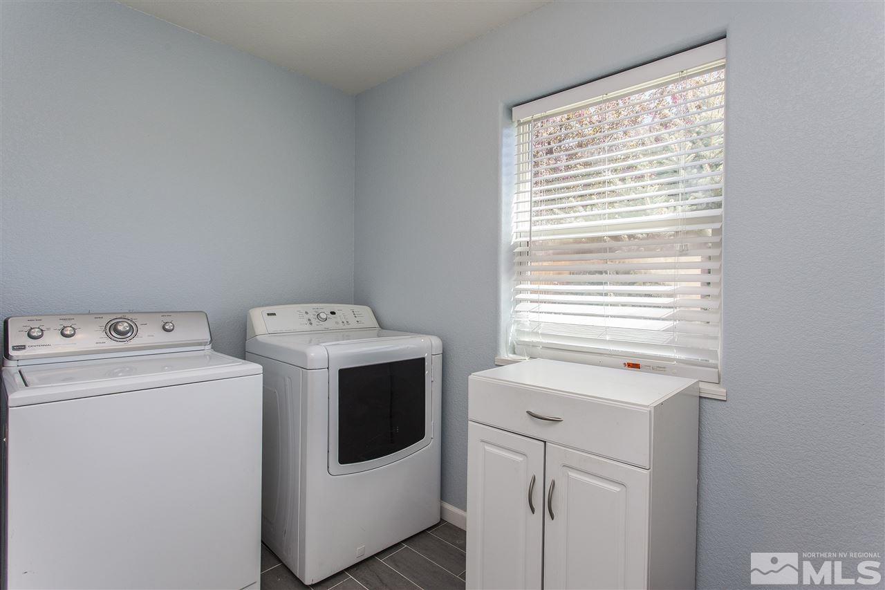 840 Roberts Street Reno, NV 89502 - Photo 19 of 25 a utility room with dryer and washer