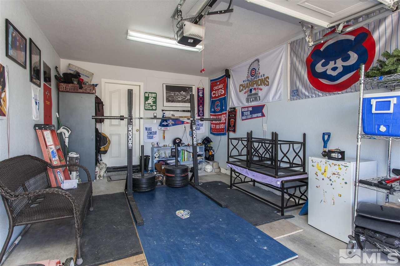 840 Roberts Street Reno, NV 89502 - Photo 20 of 25 a bedroom with furniture and wooden floor