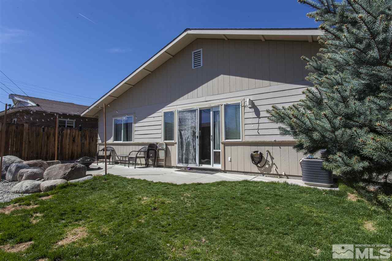840 Roberts Street Reno, NV 89502 - Photo 24 of 25 a front view of a house with garden and sitting area