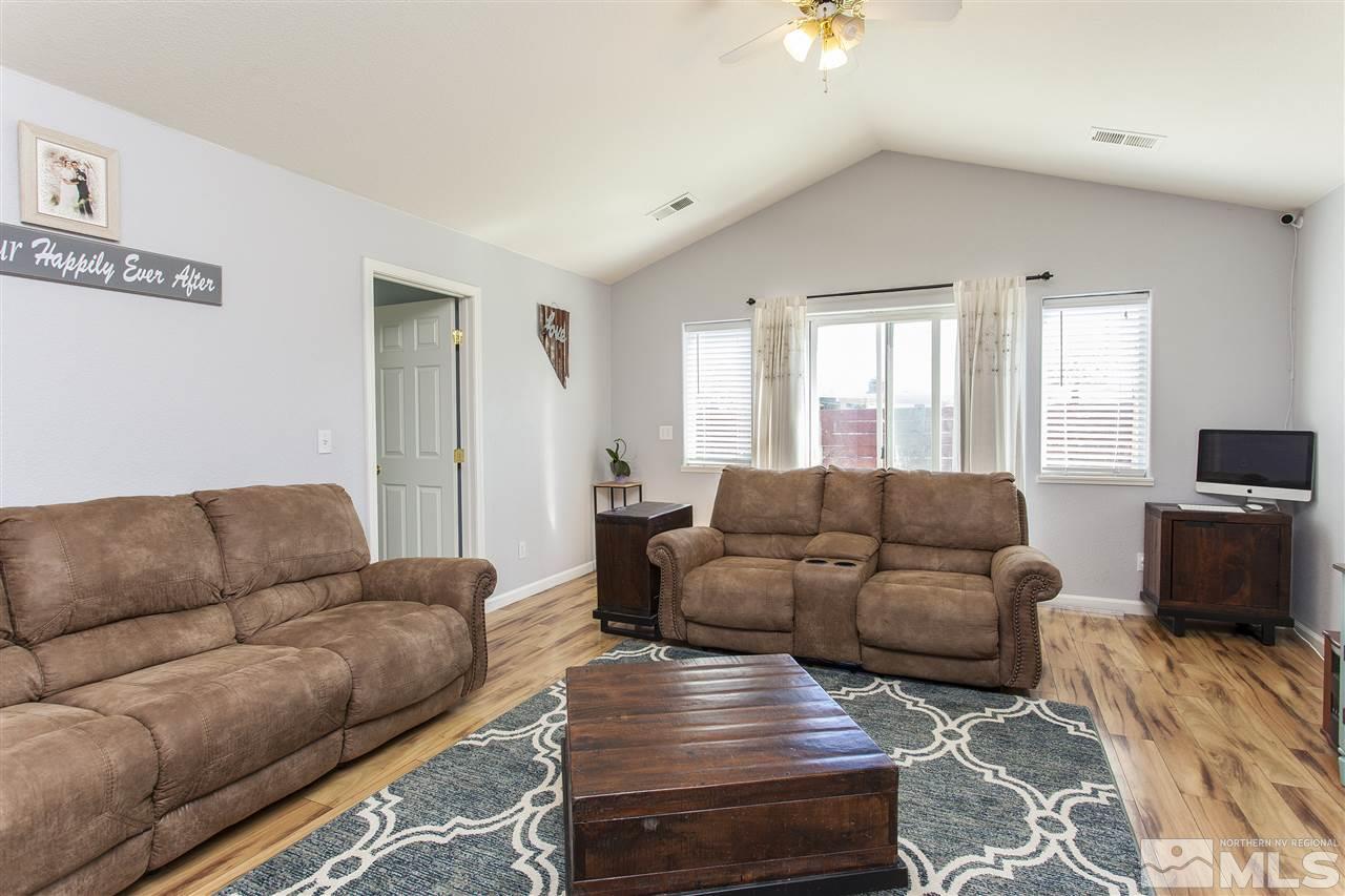 840 Roberts Street Reno, NV 89502 - Photo 4 of 25 a living room with furniture and a flat screen tv