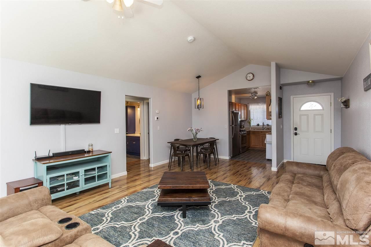 840 Roberts Street Reno, NV 89502 - Photo 6 of 25 a living room with furniture and a flat screen tv