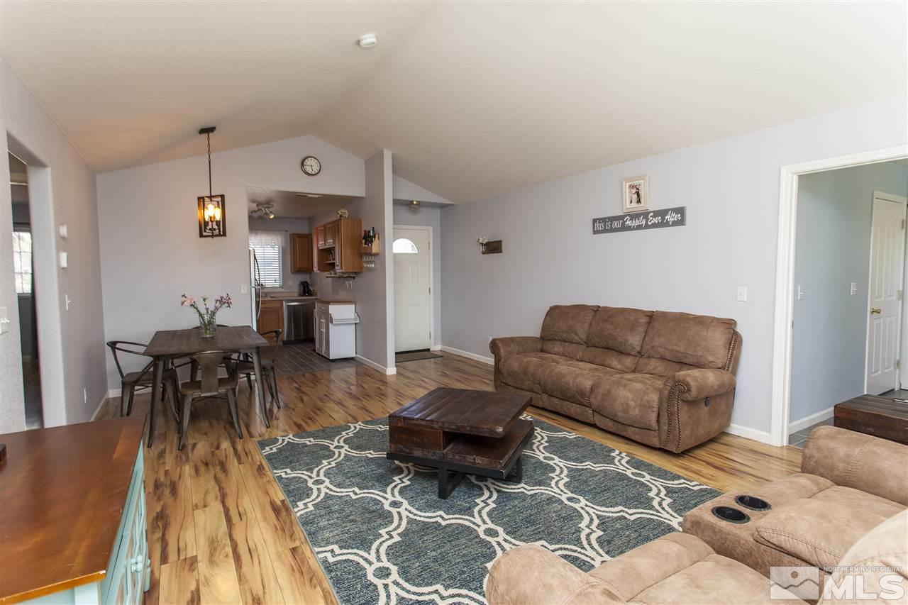 840 Roberts Street Reno, NV 89502 - Photo 7 of 25 a living room with furniture and a wooden floor