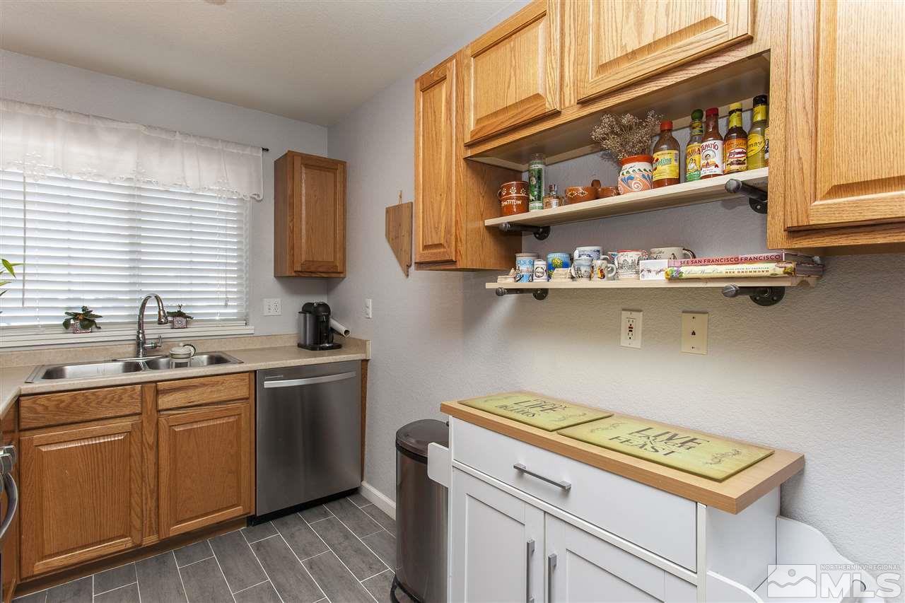 840 Roberts Street Reno, NV 89502 - Photo 9 of 25 a kitchen with a sink and cabinets