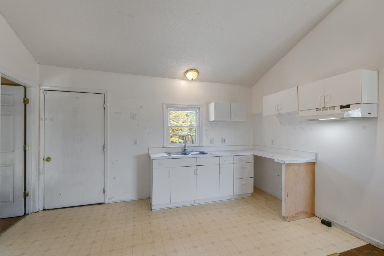 509 Surles Road Benson, NC 27504 - Photo 24 of 30 Apartment Kitchenette & Entrance
