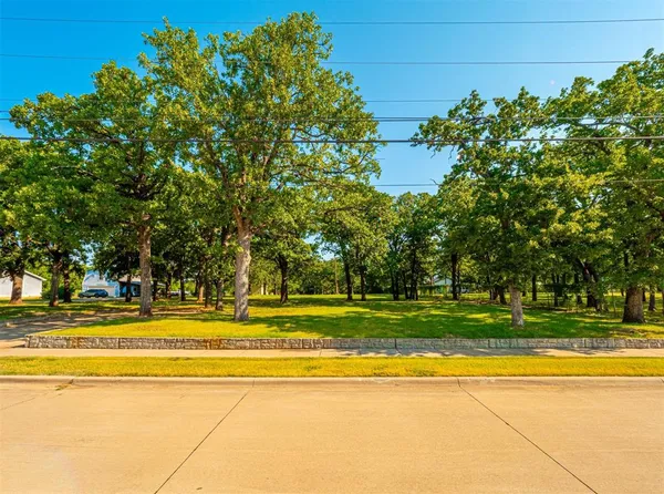 a view of a swimming pool with an outdoor space and seating area