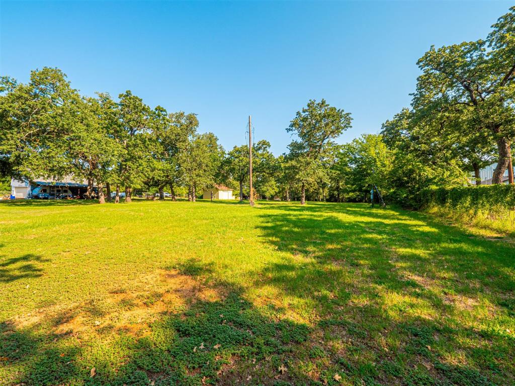 2801 Russell Road Arlington, TX 76001 - Photo 8 of 26 a view of a swimming pool and an outdoor space