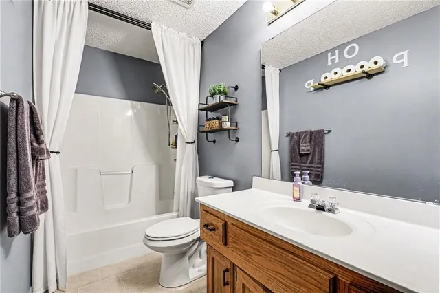 $327,000 | 1307 South Huntington Drive, Greenwood, MO 64034