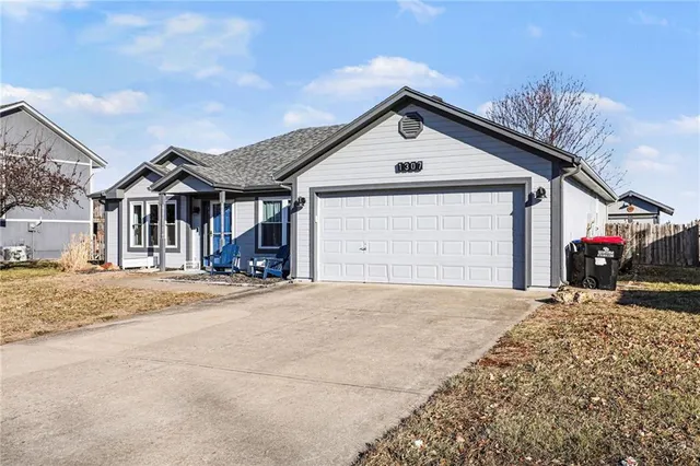 $327,000 | 1307 South Huntington Drive, Greenwood, MO 64034