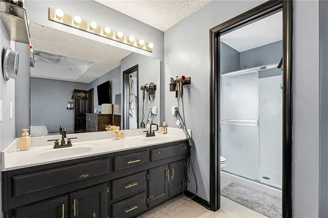 $327,000 | 1307 South Huntington Drive, Greenwood, MO 64034