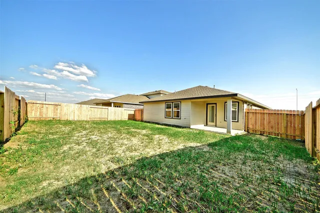 a big room with yard and plants