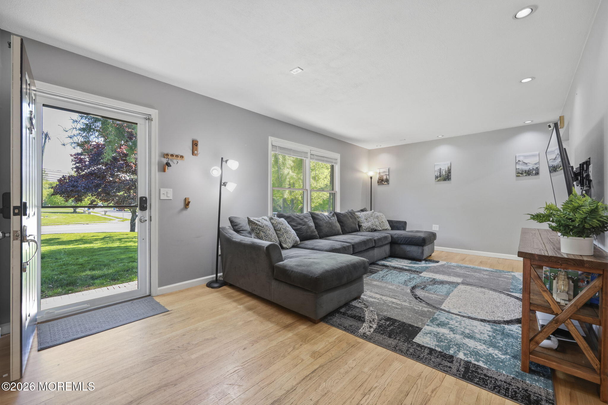 356 Leesville Road Jackson, NJ 08527 - Photo 10 of 46 a living room with furniture and a large window