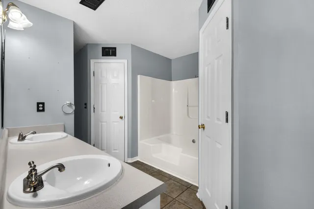 a bathroom with a sink and a tub