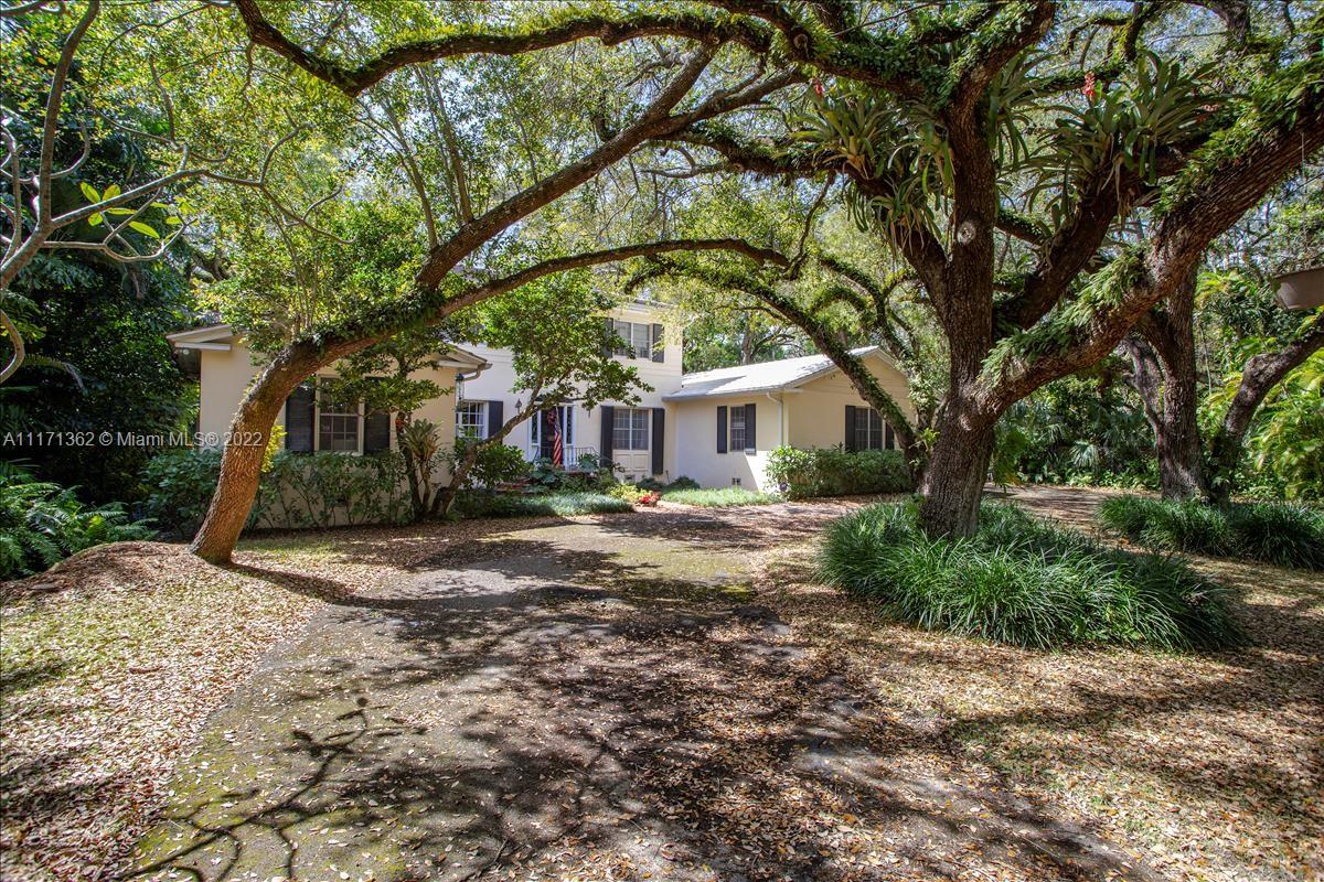 4690 Southwest 74th Street Miami, FL 33143 - Photo 8 of 8 a front view of a house with garden