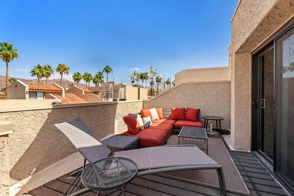 a outdoor living room with furniture