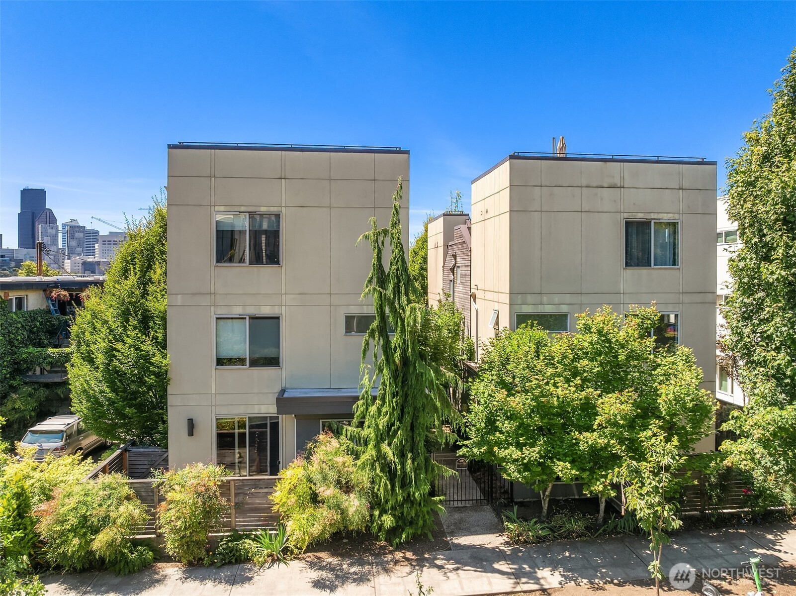 933 16th Avenue, Unit A Seattle, WA 98122 - Photo 1 of 19 a view of a house with a yard