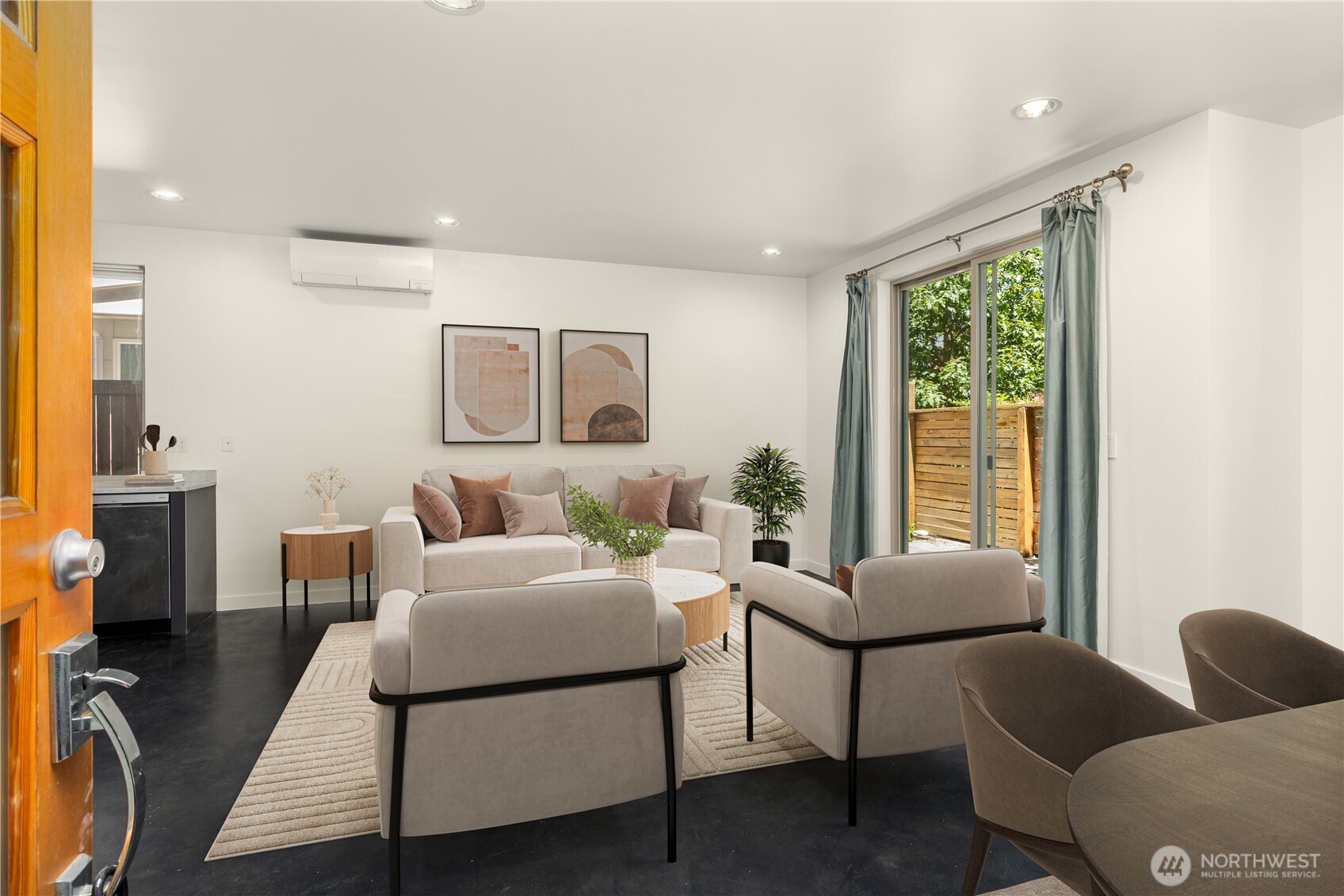 933 16th Avenue, Unit A Seattle, WA 98122 - Photo 6 of 19 a living room with furniture and a window