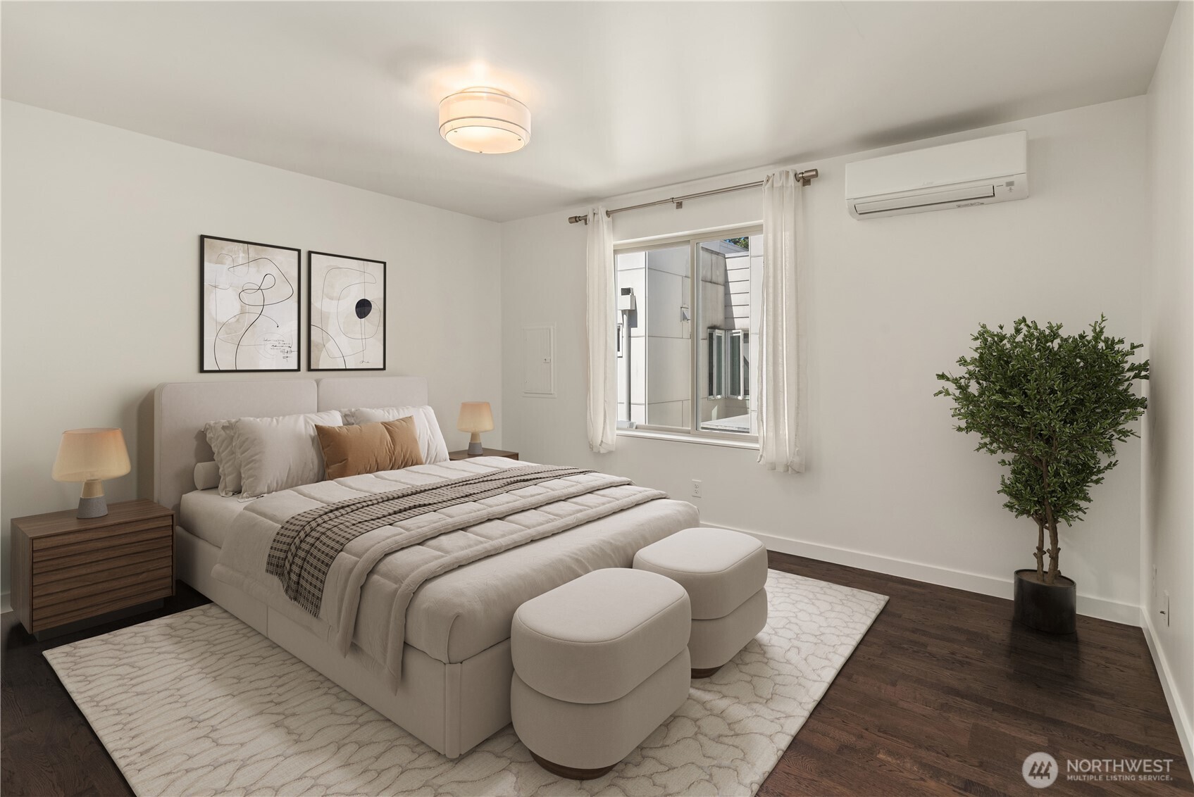 933 16th Avenue, Unit A Seattle, WA 98122 - Photo 9 of 19 a bedroom with a bed and a potted plant