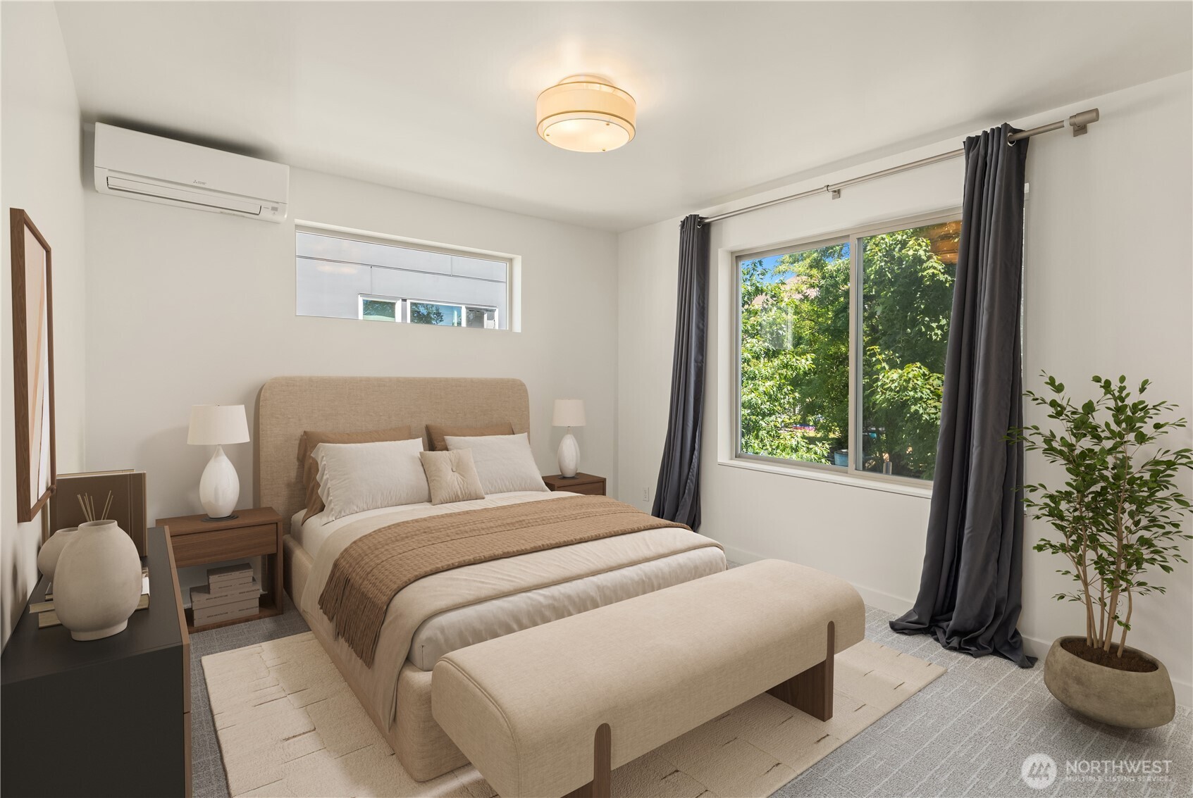 933 16th Avenue, Unit A Seattle, WA 98122 - Photo 10 of 19 a bedroom with a bed and a potted plant