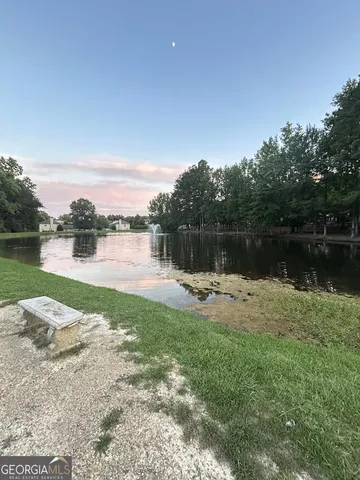 a view of a lake with a big yard