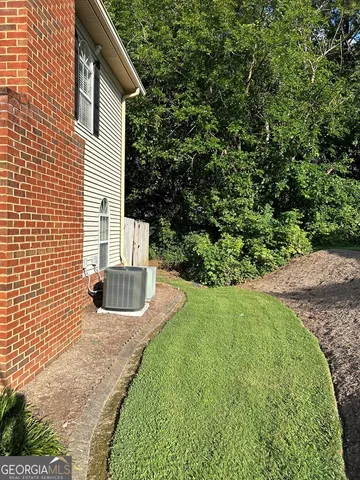 a view of a backyard with a garden