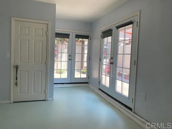 an empty room with windows