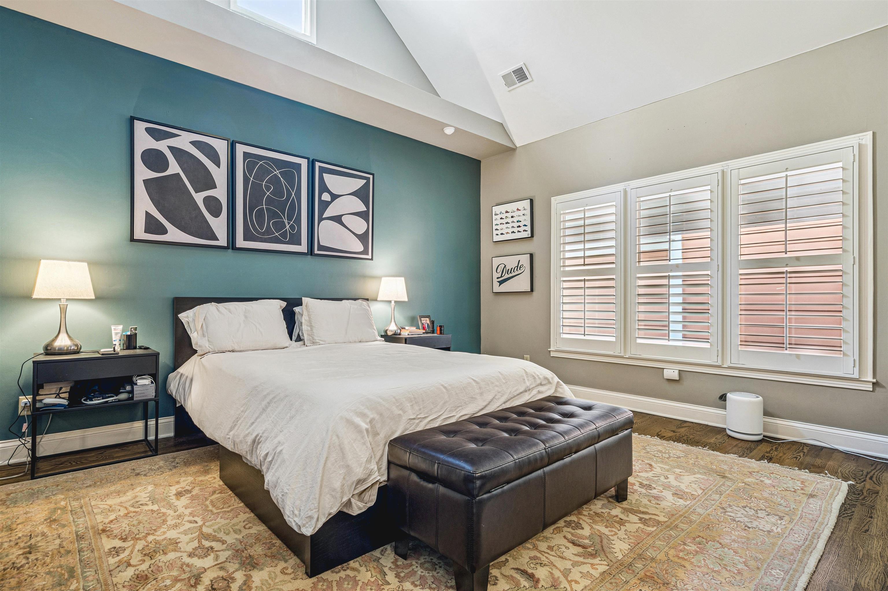 942 Harbor Bend Road Memphis, TN 38103 - Photo 16 of 25 a bedroom with a bed and a painting on the wall