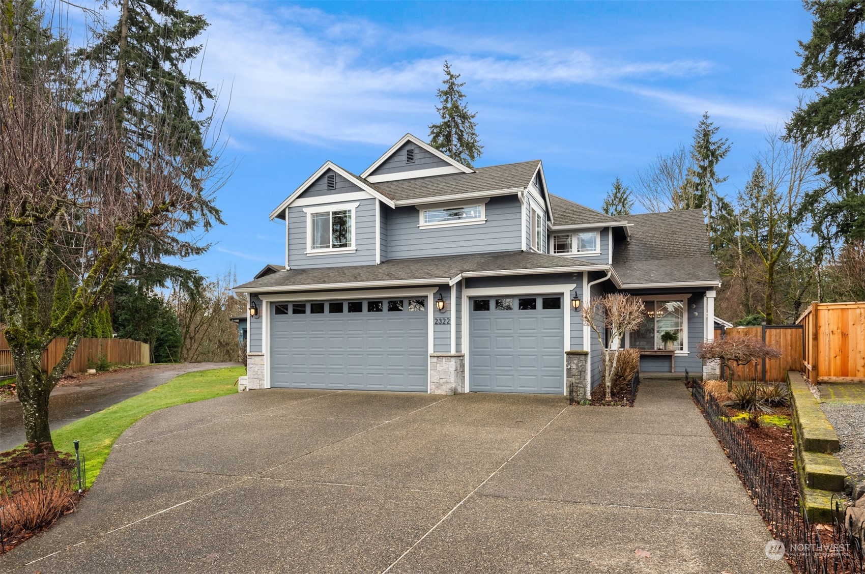 2322 241st Place Southwest Bothell, WA 98021 - Photo 1 of 1 a front view of a house with a yard