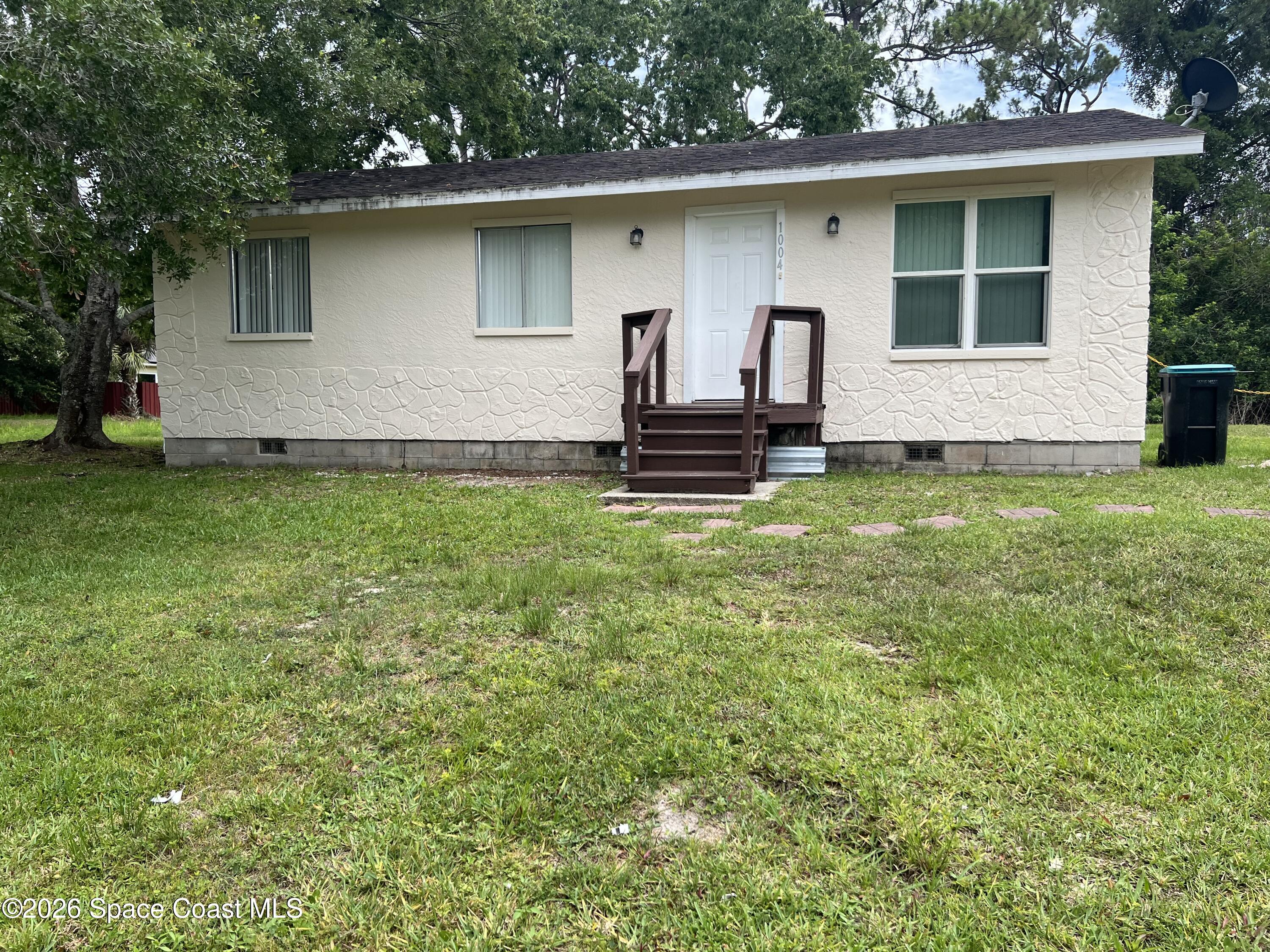 1004 Whisper Road Southeast Palm Bay, FL 32909 - Photo 1 of 4 Front of Home