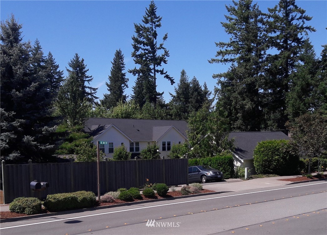 24057 Witte Road Southeast Maple Valley, WA 98038 - Photo 5 of 8 a view of a house with a street