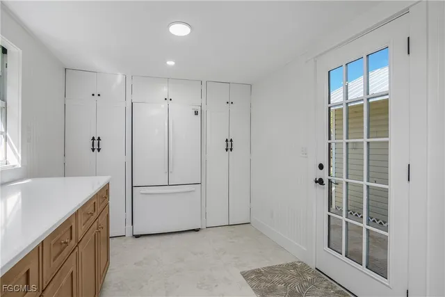 a bathroom with a shower and a sink