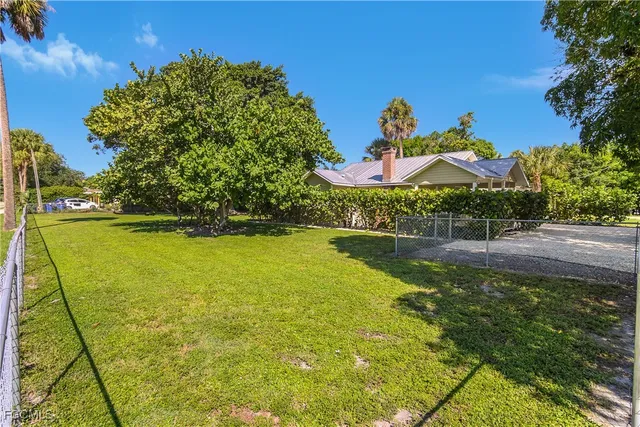 a view of a lake with a big yard
