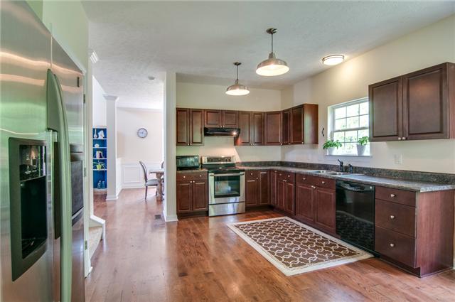 7229 Blue Ridge Drive Fairview, TN 37062 - Photo 5 of 20 Big eat-in kitchen offers lots of counter space and huge pantry. Steps away from the garage with a private covered deck and adjoining laundry room make this the hub of the house.