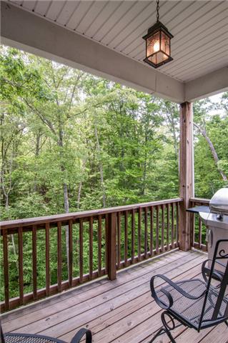 7229 Blue Ridge Drive Fairview, TN 37062 - Photo 6 of 20 Here's the deck off the kitchen for convenience when you are watching the steaks and need to prepare the salad at the same time.
