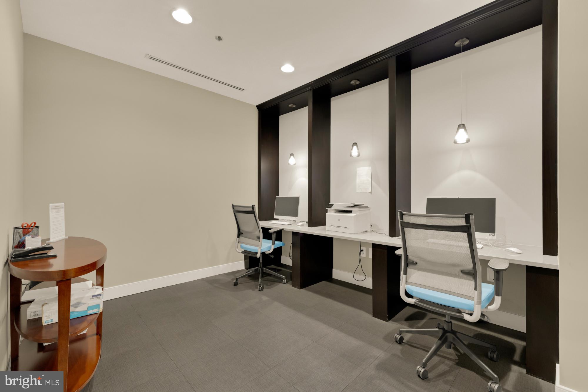 50 Florida Avenue Northeast, Unit 412 Washington, DC 20002 - Photo 23 of 29 a view of a workspace with furniture and a bathroom