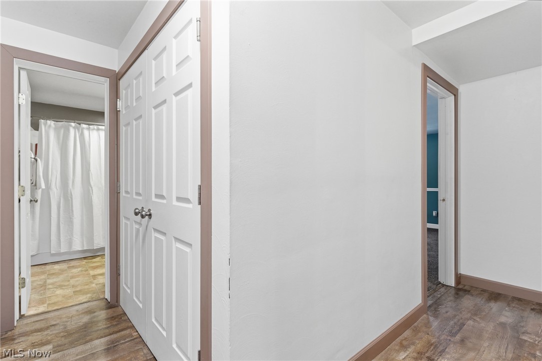 6291 Downs Road Northwest Warren, OH 44481 - Photo 15 of 44 Corridor featuring wood finished floors