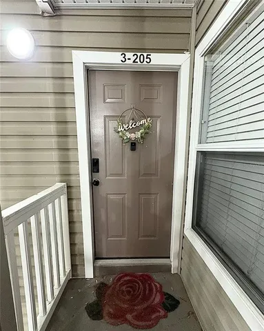 a view of a hallway with entryway