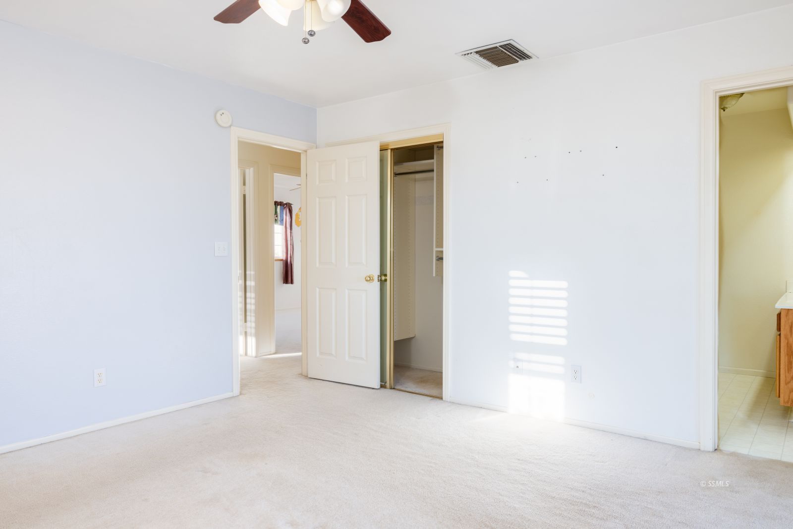 1359 Maturango Street Ridgecrest, CA 93555 - Photo 23 of 38 an empty room with a ceiling fan and a window