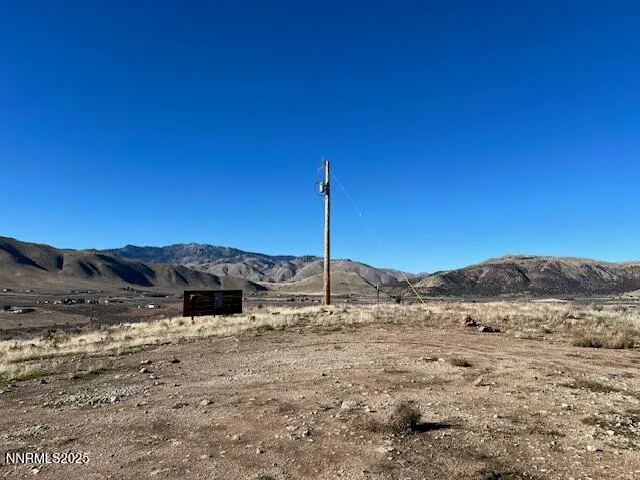 a view of a house with a mountain