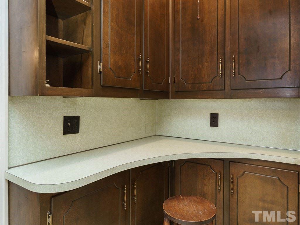 713 Kimbrough Street Raleigh, NC 27608 - Photo 11 of 25 a close view of cabinet