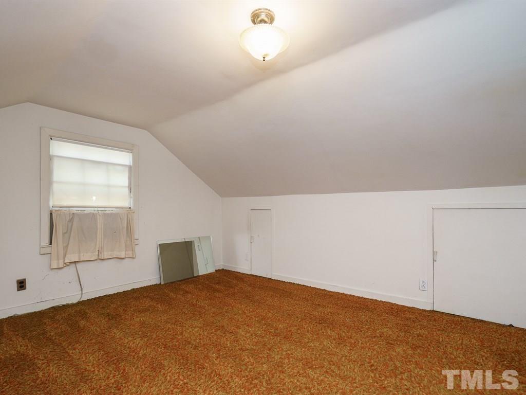 713 Kimbrough Street Raleigh, NC 27608 - Photo 21 of 25 a view of empty room with windows