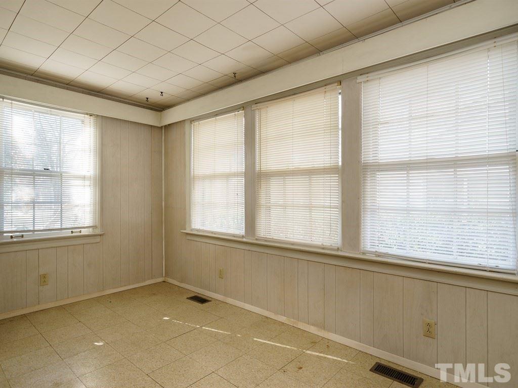713 Kimbrough Street Raleigh, NC 27608 - Photo 6 of 25 a view of an empty room with a window