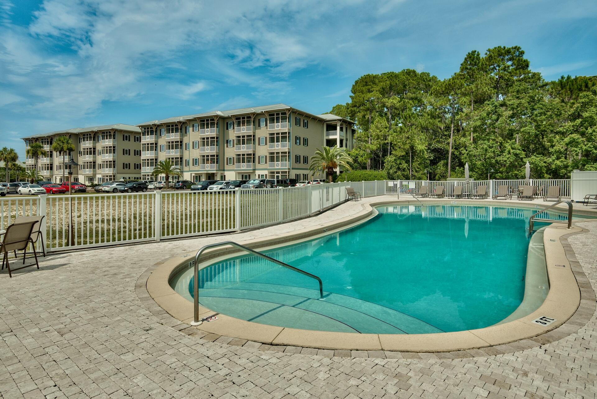 231 Somerset Bridge Road, Unit 1401 Santa Rosa Beach, FL 32459 - Photo 1 of 38 a view of a swimming pool with a balcony